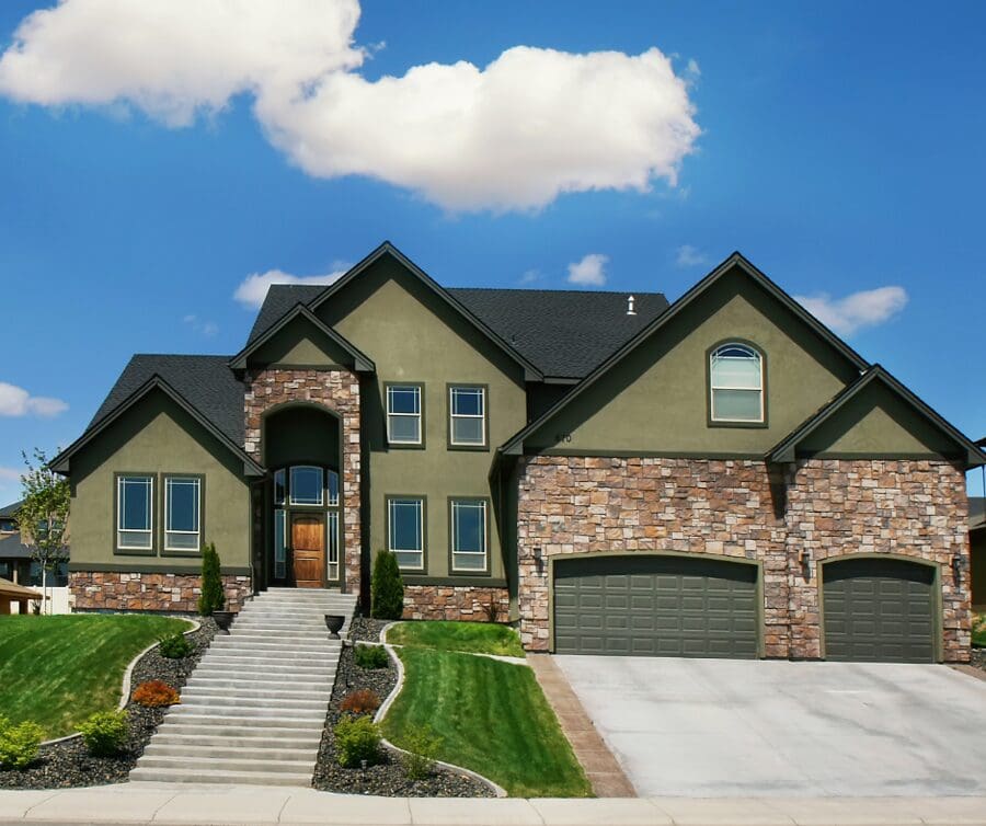 a large house with a beautiful, cost-effective metal roof