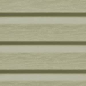 Close-up texture of sage green vinyl siding panels with a subtle woodgrain finish, emphasizing durability and aesthetic appeal. This siding option from Wagner provides a classic, clean look while protecting the home from weather elements, ideal for enhancing curb appeal.